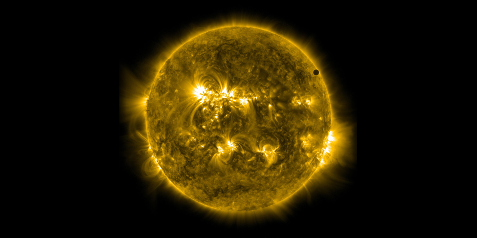 The Transit of Venus in 2012. The solid black disk of Venus is visible just inside the limb of the Sun near the 2 o’clock position in this ultraviolet image taken with the Solar Dynamics Observatory spacecraft.